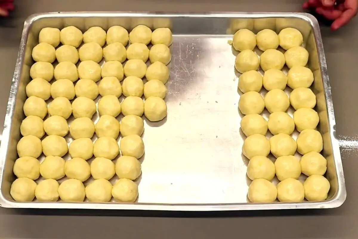Pão de queijo mineiro com casquinha dourada e aquele miolo macio que derrete na boca