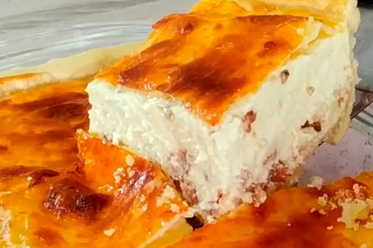 Receita de torta de queijo super cremosa com uma massa super simples de preparar